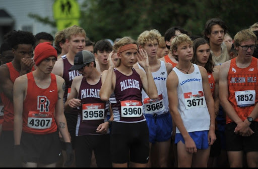 Palisade Zenon Reece, Quintin Motter, and Dawson David line up at the start of the race.