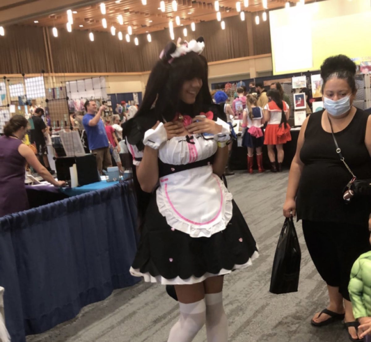 A cosplayer interacting with people at the event
Provided by: Karizma Woodard 

