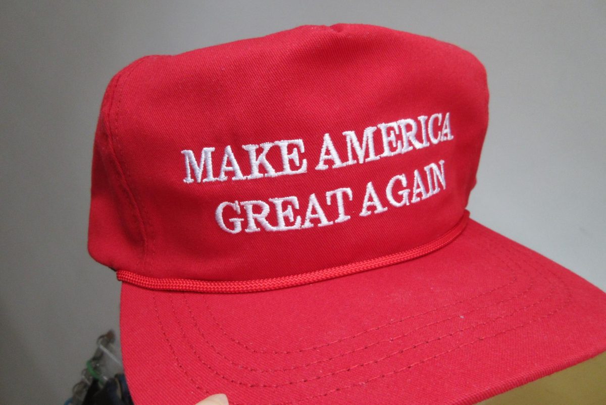 The red hat cap cotton white words Make America Great Again. Photo provided by: @Champtrumping on Wikimedia Commons. 