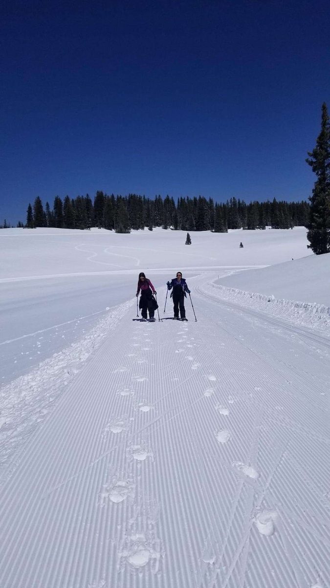  Akelia Calkins and a friend having fun skiing in the snow.
Picture provided by Akelika Calkins
