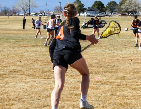 Madison DeGeorge playing lacrosse.