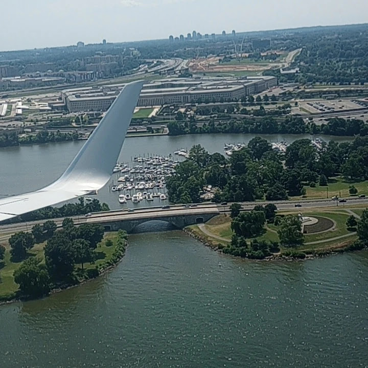 Plane Flying near Bridge and Pentagon