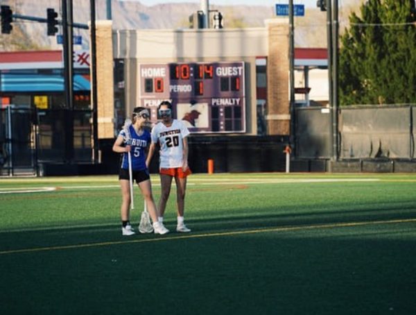 Jackie Flores and Fruita’s Gianna Diederich talking on the field Monday night 
Photo Provided by: Jackie Flores 
