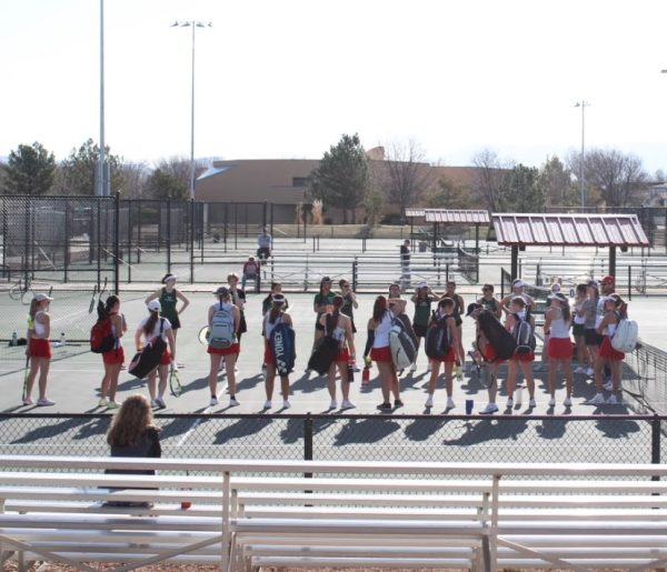 The WarDog tennis team as they lined up before their victorious win over Bear Creek.
Photo taken by Nikki Smith