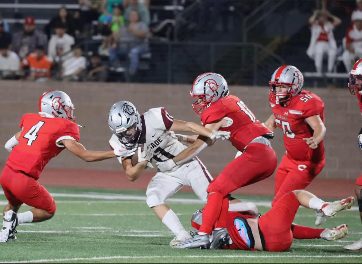 Varsity Kaleb Reed as he gets tackled by Central players.
Photo provided by Kaleb Reed