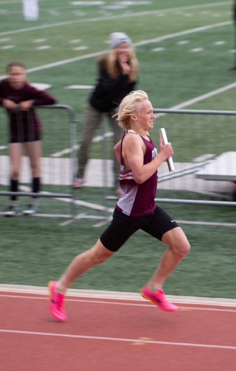 Hank DeFord running in a track meet. Photo provided by Hank.