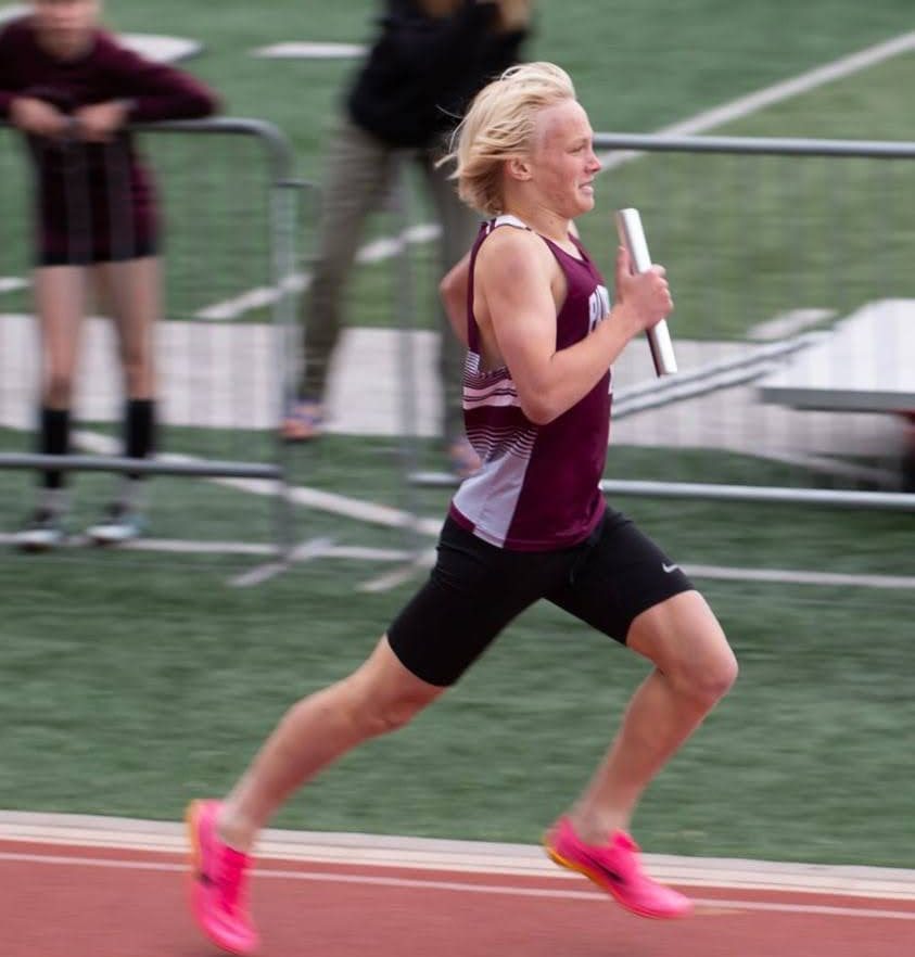 Hank DeFord running in a track meet. Photo provided by Hank.