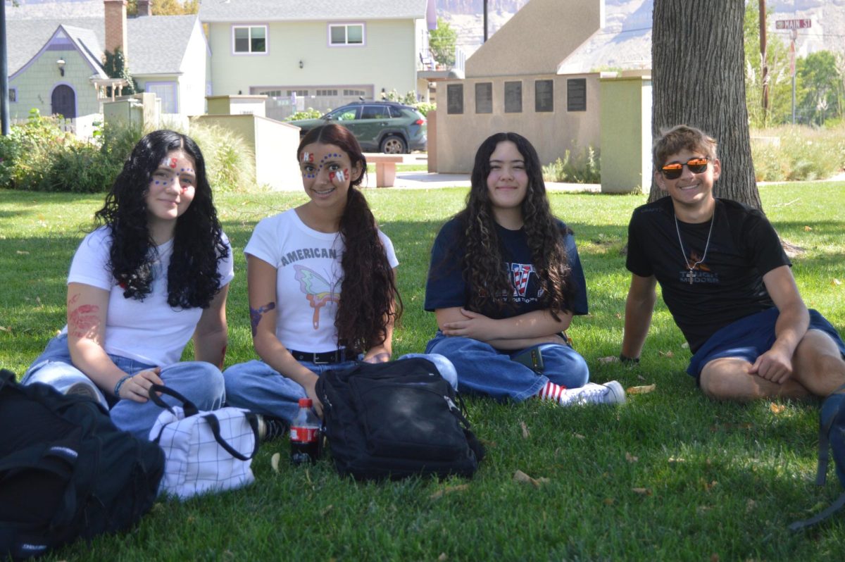 Palisade High School students enjoying their time while waiting for the parade.