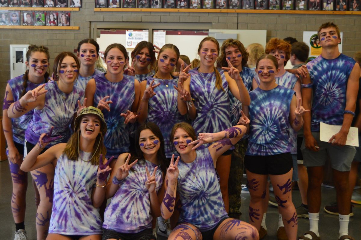 Juniors Powder Puff posing for a picture.