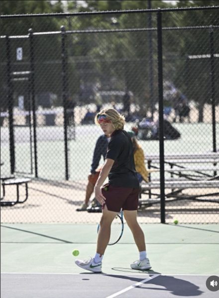 Andrew Kischenmann playing tennis.
 Photo Provided by Andrew Kirschenmann