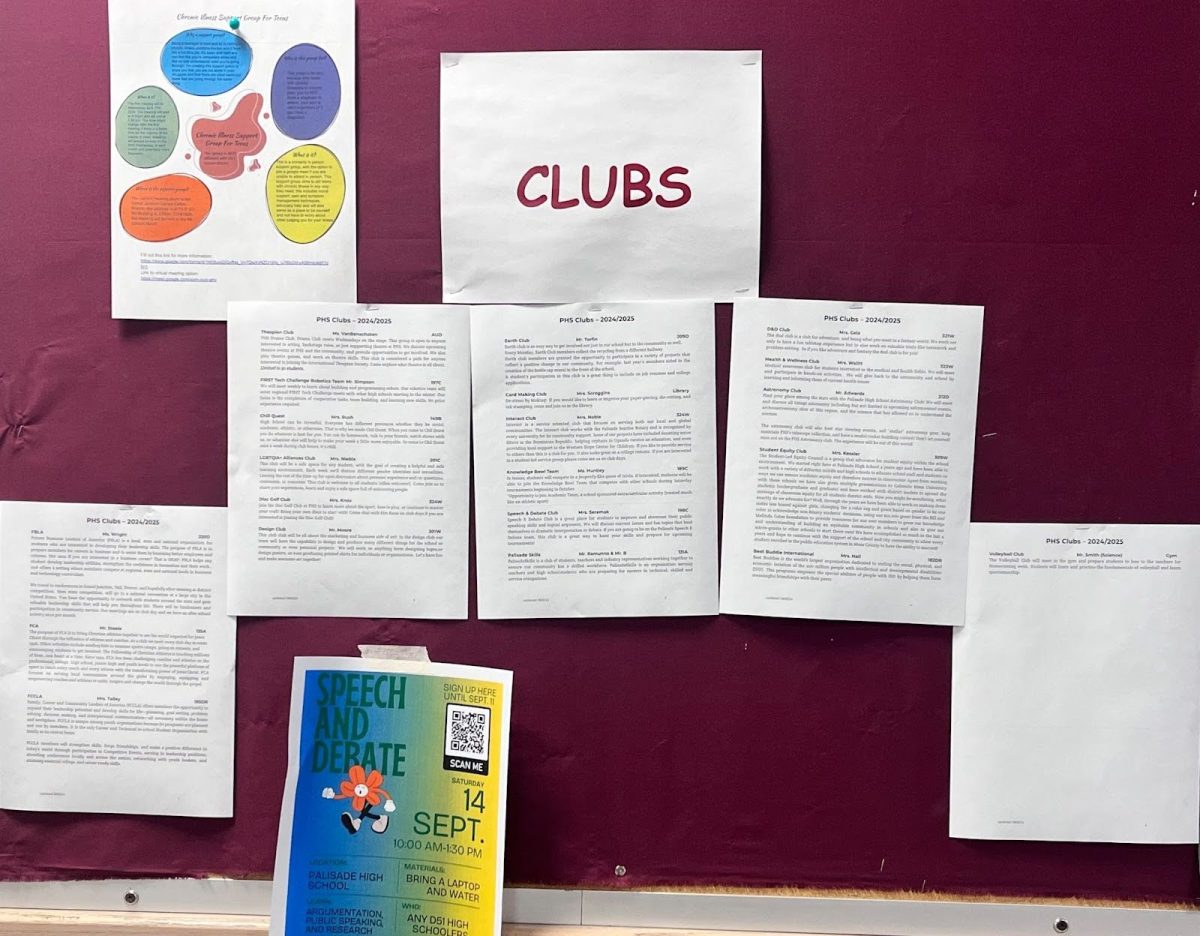 The club board in the main hall displaying teacher sponsors and club information