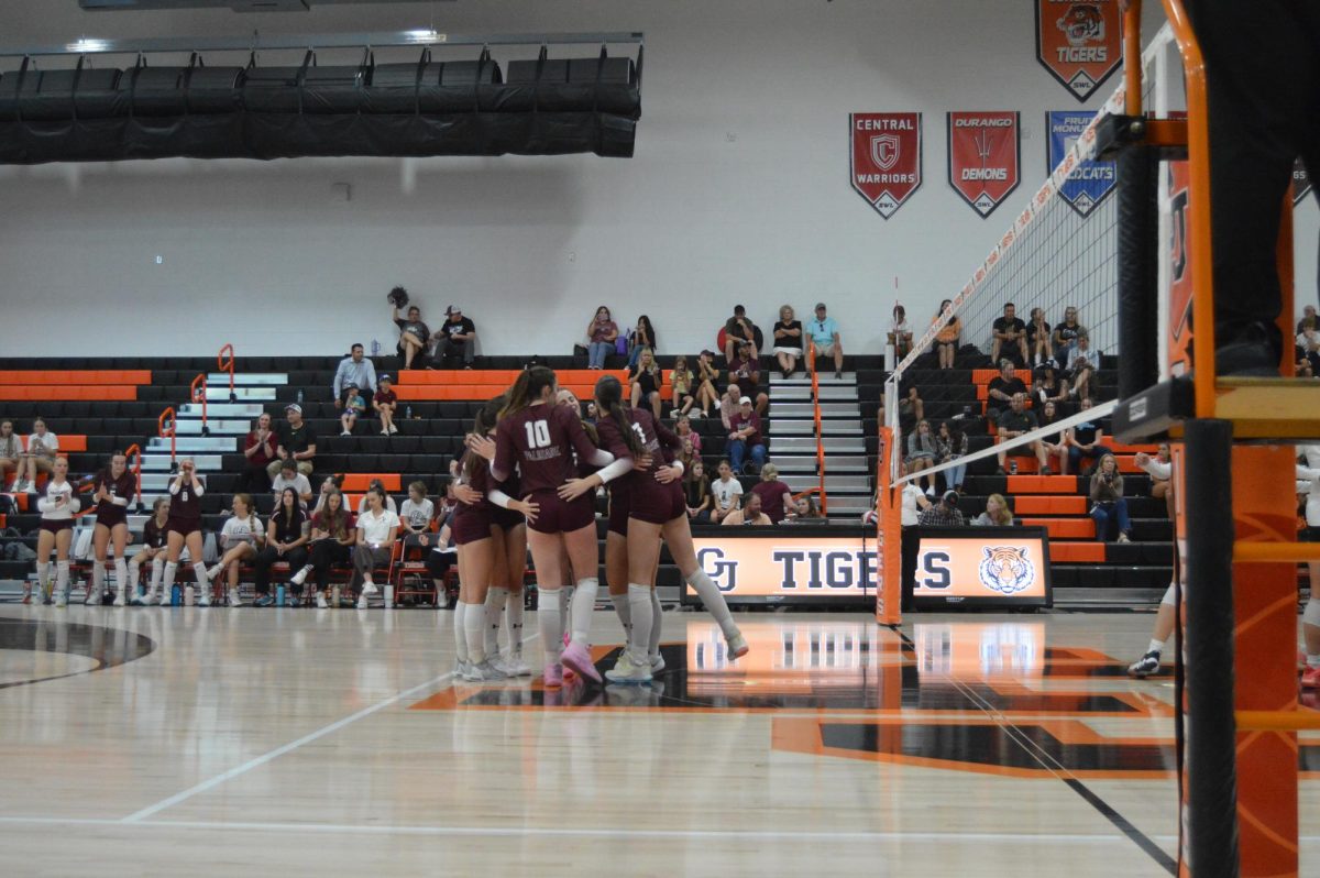 Bulldogs celebrating after one of Senior Addie Ritterbush’s kills