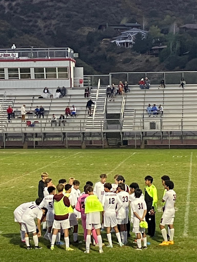 Head Coach Lane Lorenzo talking to his team