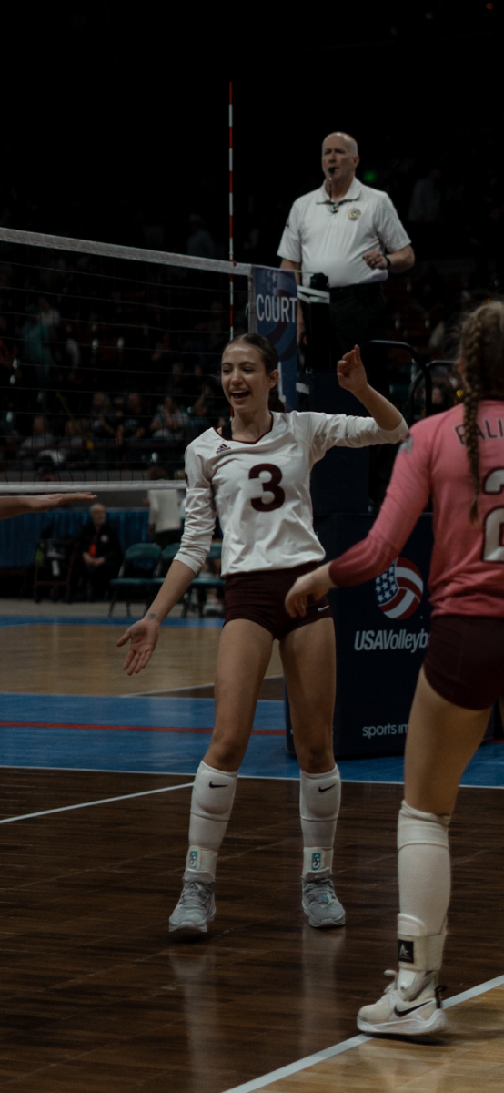 Braeleigh MacAskill smiling with her team during the state tournament in 2023. Photo provided by Braeleigh