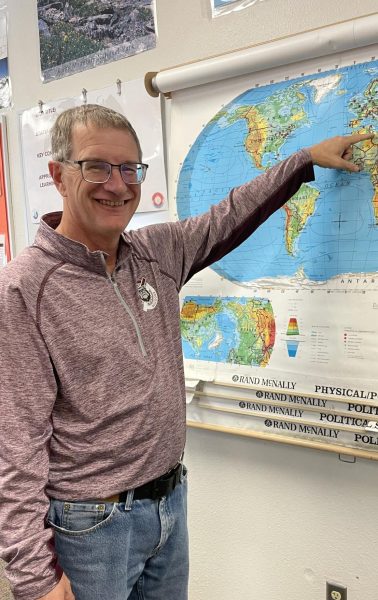 Mr. Kennedy pointing at Ukraine