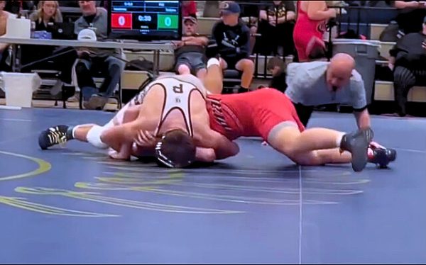 Palisade wrestler, Vernon Belyeu wrestling at the Olathe Tournament. 
Photo provided by: Vernon Belyeu