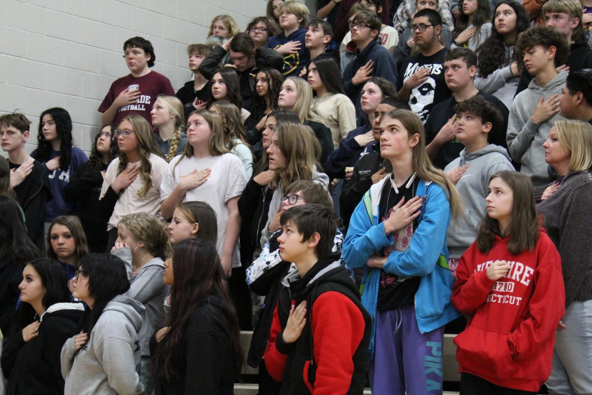 Palisade students shown during a school assembly.