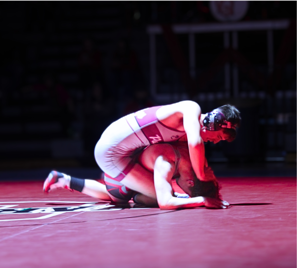 Senior Jeremia Woolery wrestling at Central High School against the Central Warriors.