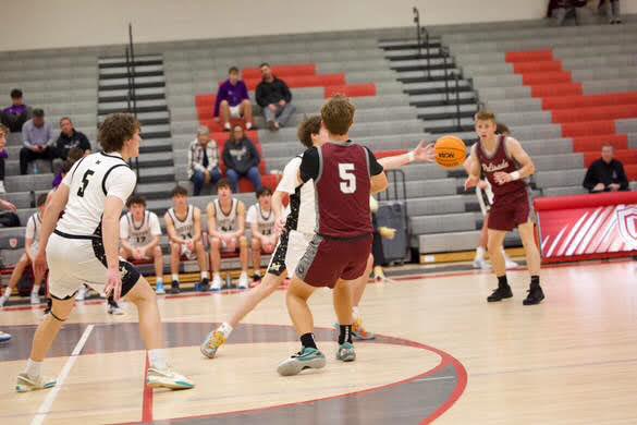 LJ Ballenger passing the ball to his teammate, Hunter Howard. Photo provided by Ballenger