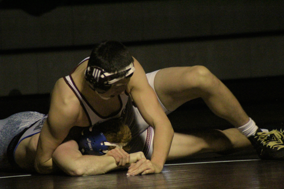 Freshman Vernon Belyeu wrestling against Fruita.