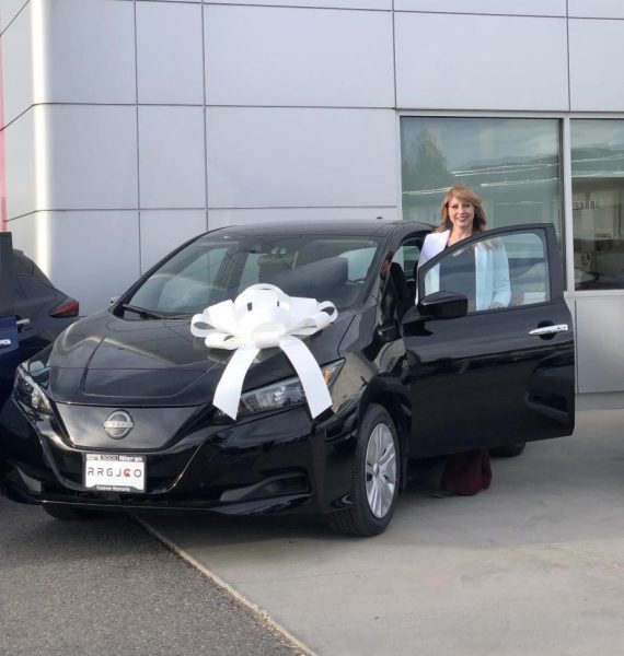 Mrs. Green and her new Nissan Leaf. Photo provided by Mrs. Green.