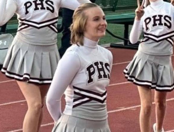 Kai Ruebush appreciating the crowd during a football game.