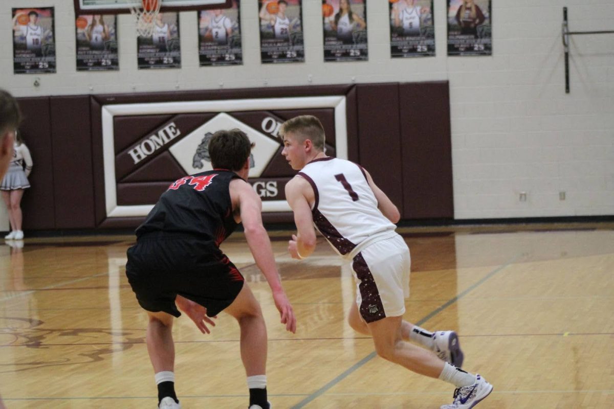 hunter howard driving the ball. 