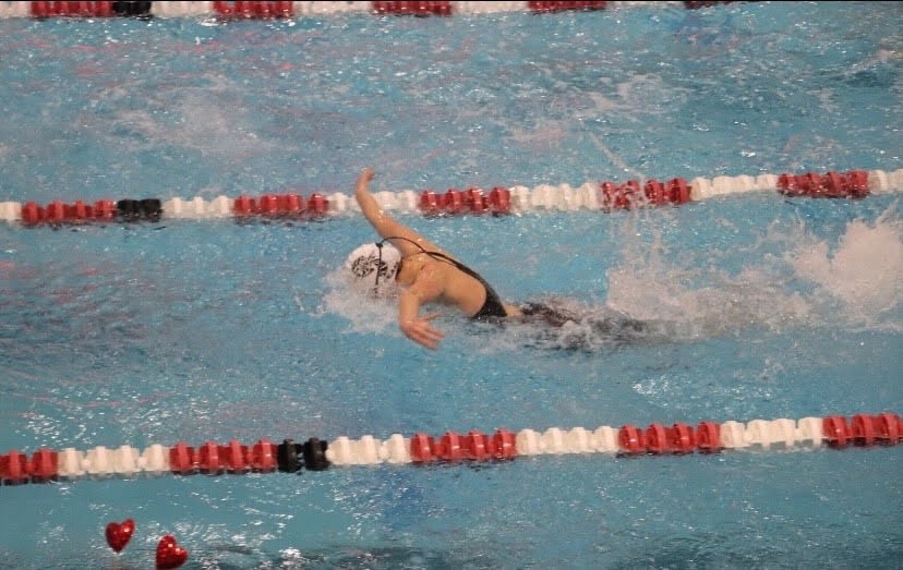 Emily Hardin swimming at a meet this season. 