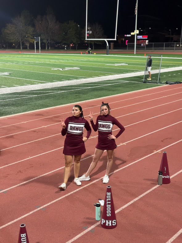 Kylee McLaughlin (Left) and her cheer teammate (Right). 