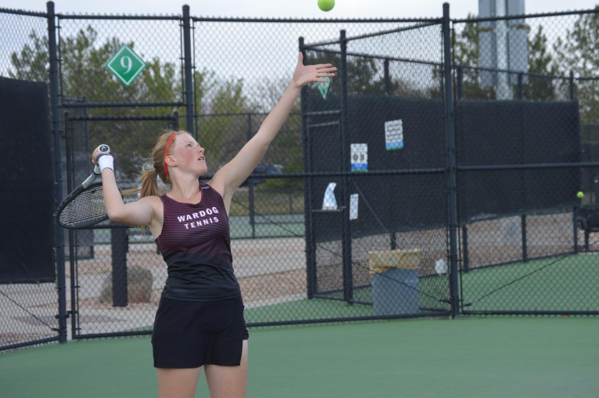 Freshman Annie Smith ready to serve the ball.