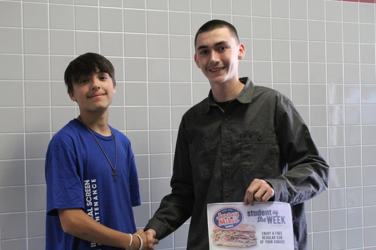 Everett Henson receiving his award 