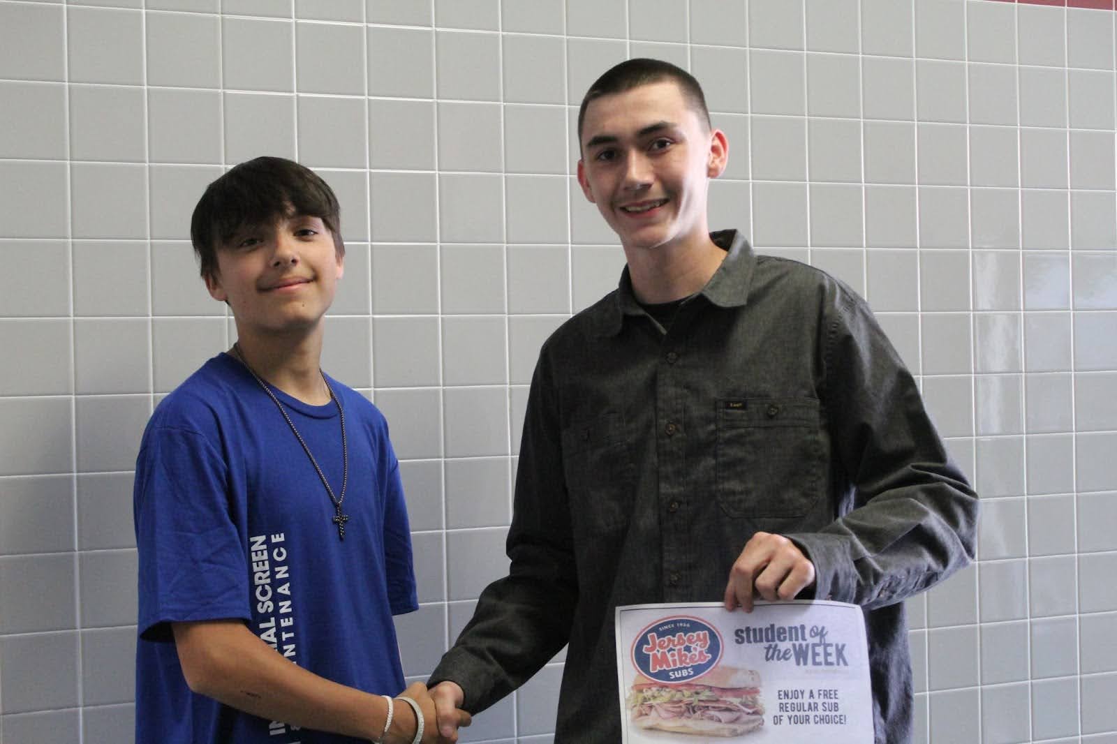 Everett Henson receiving his award