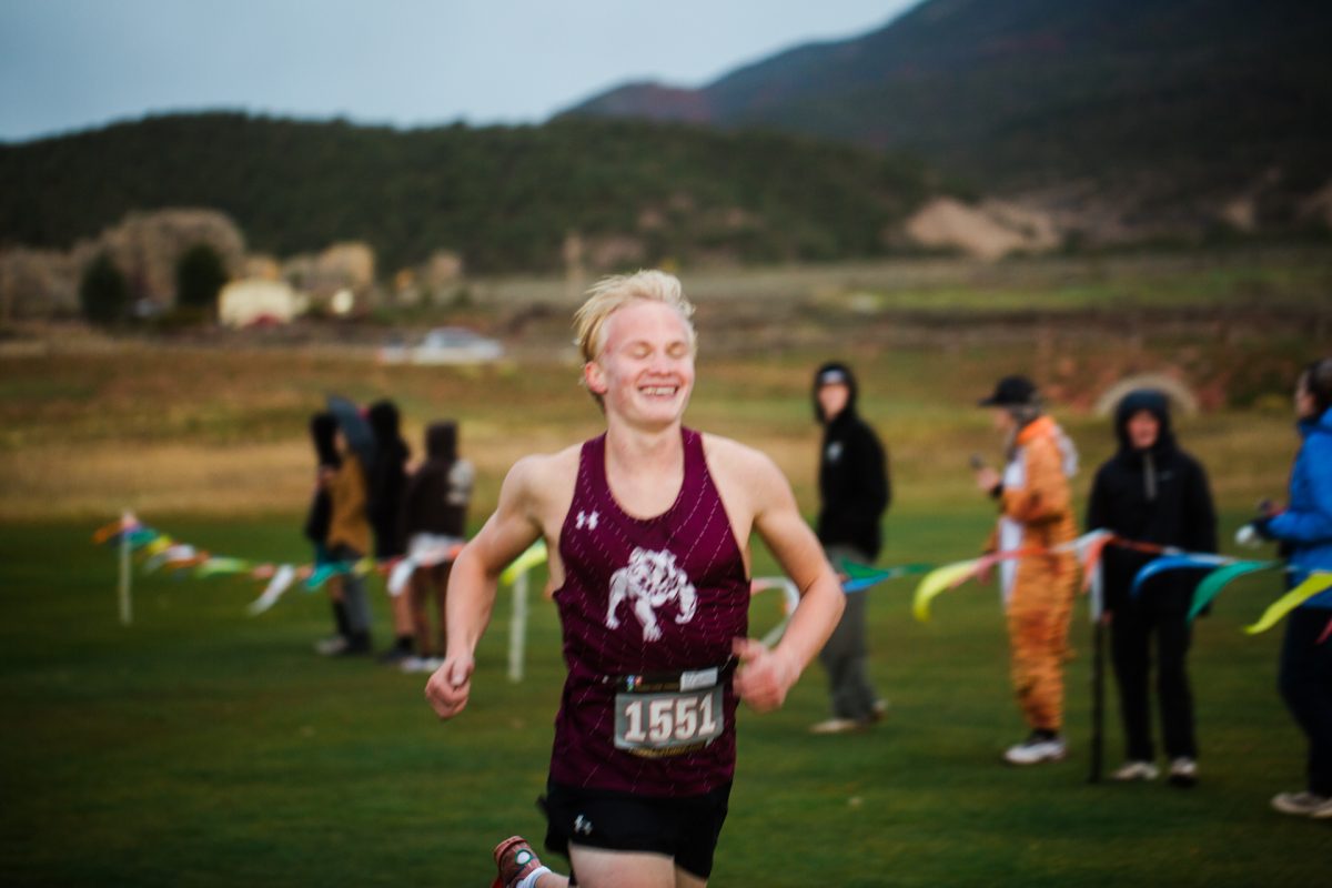 Hank Deford finishing the cross country regionals race.