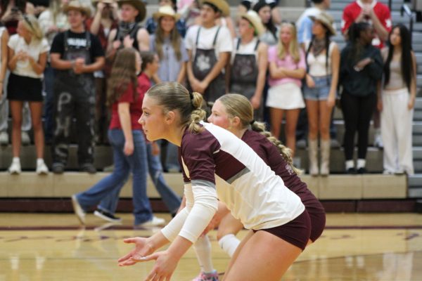 Lizzy Snover and Bo Reimer getting ready to receive the ball