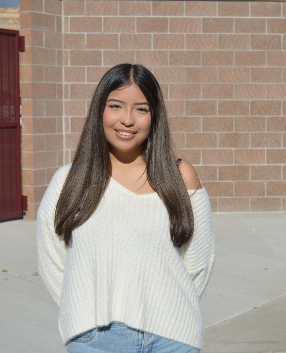 Sophomore Ashley Guerra posing outside.