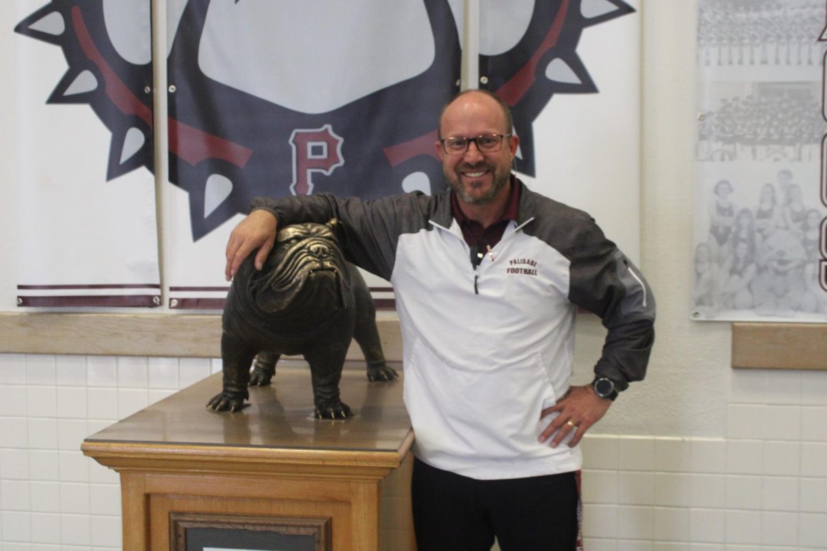 Mr. Bollinger getting his photo taken.