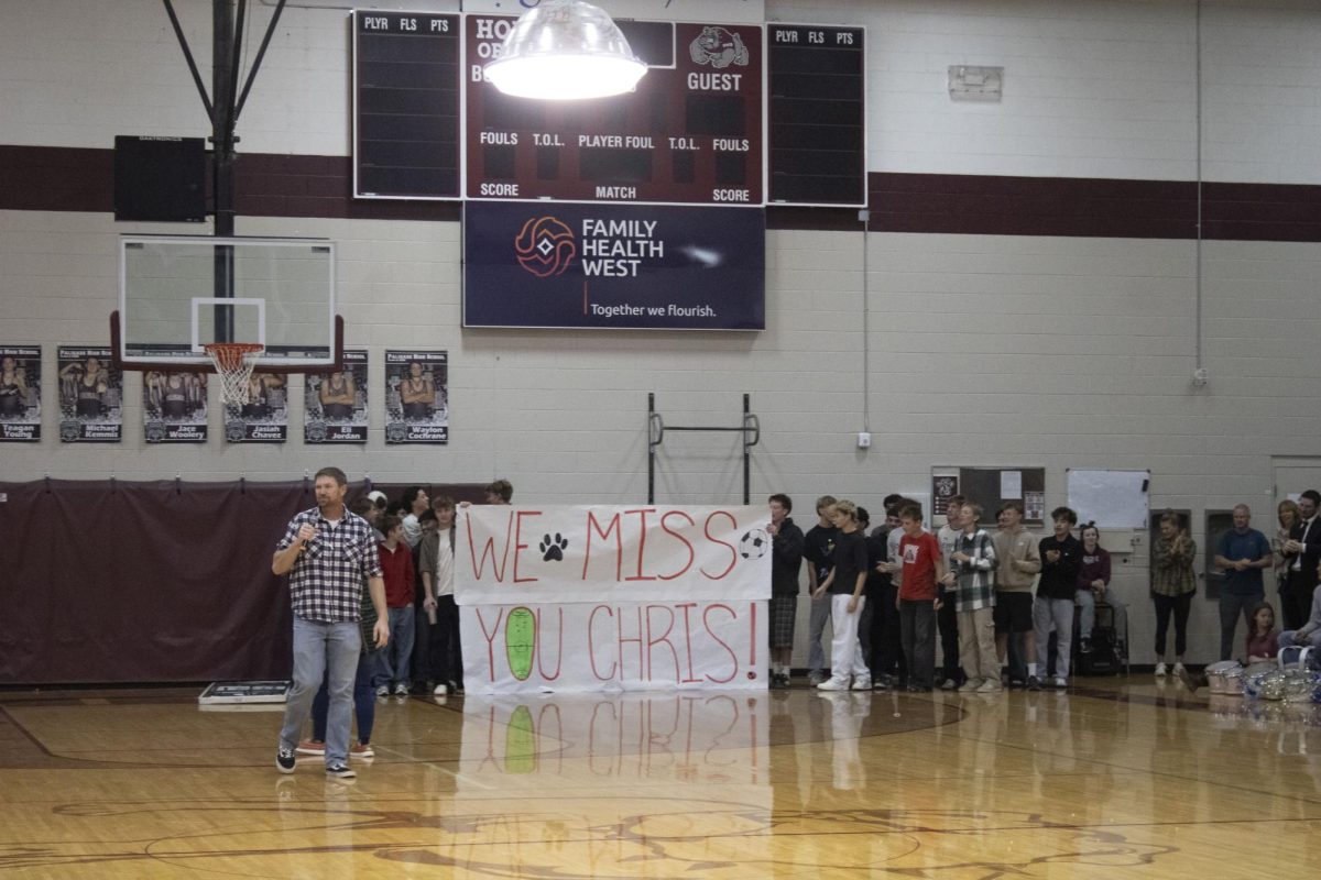 Soccer team showing support for Christopher Perez at pep rally.