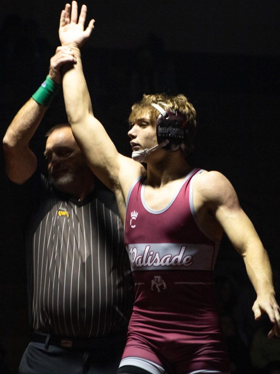 Eli Bency dominating against Grand Valley Wrestling Team.