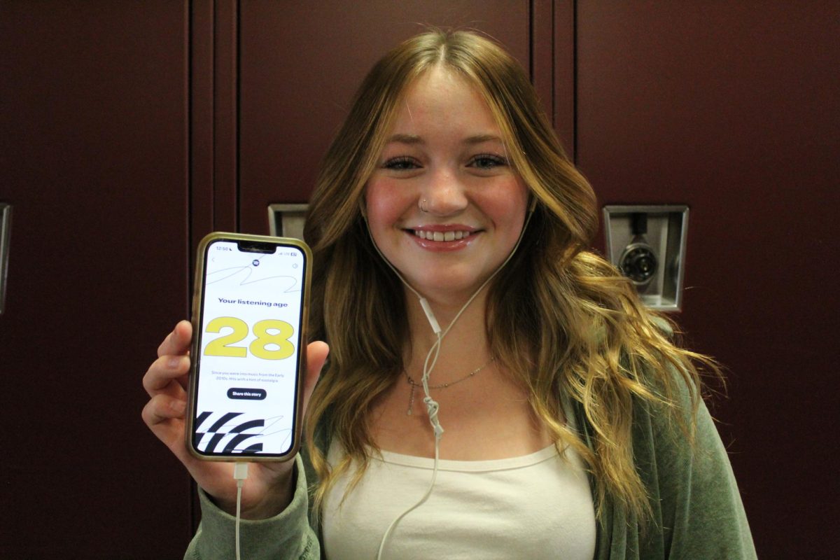 Senior Natalia Arnold smiles at her listening age of 28. 