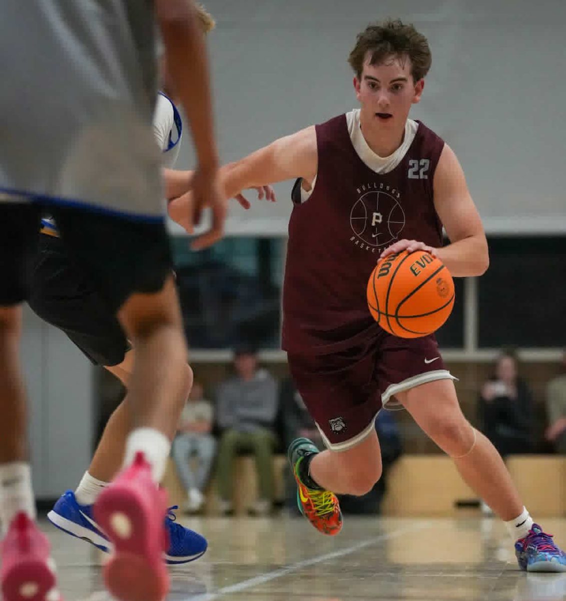 Rye Gingerich play basketball for palisade high school during a tournament.