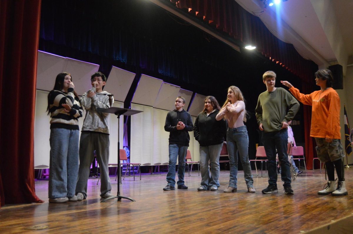 Junior Evelyn Forte, Sophomore Jack Yu, and the 7th hour acting class acting out an Oscar nomination.