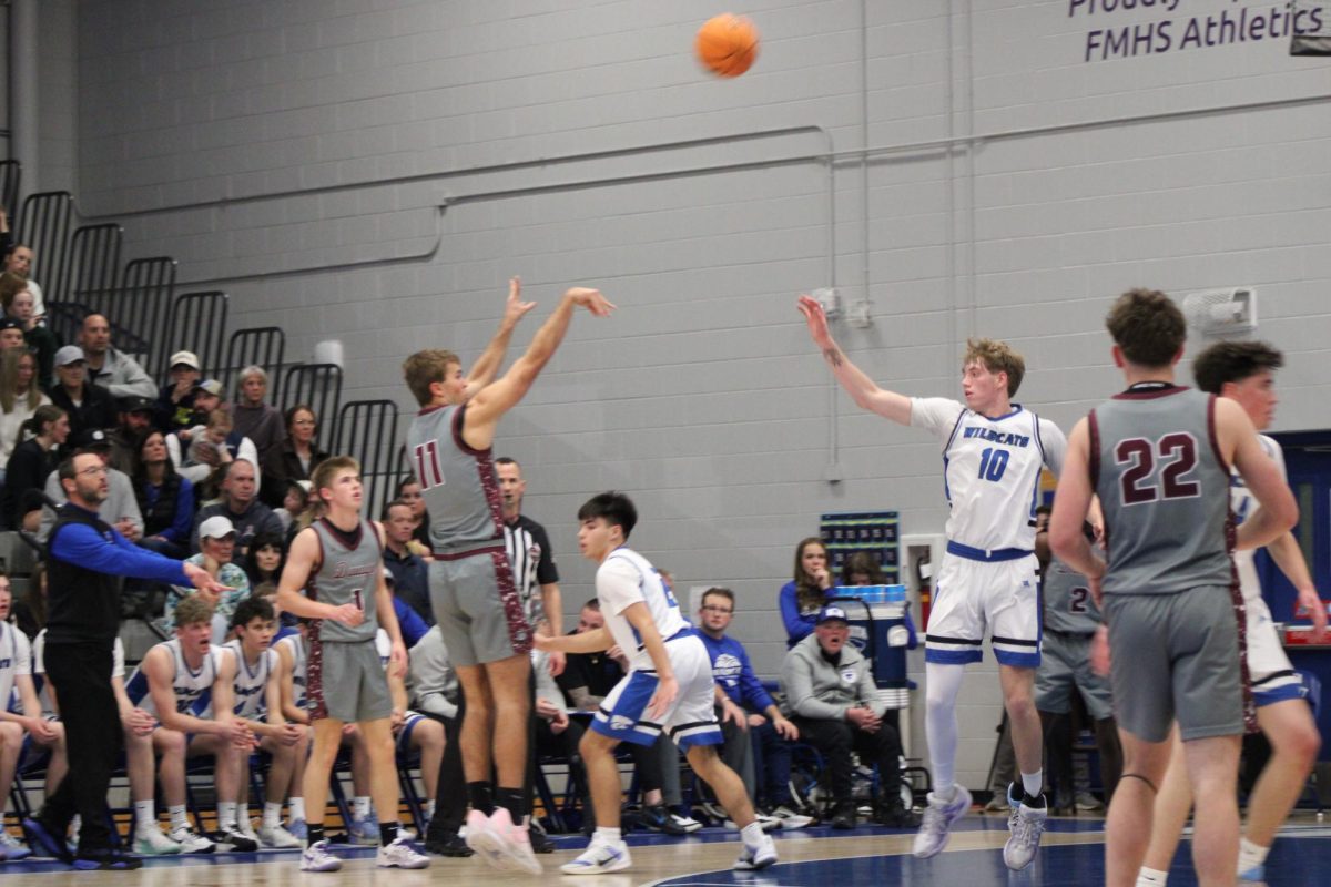 Branson Springer shooting a Three Pointer