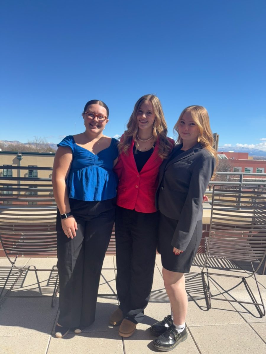 Juniors Piper Wesolowski, Marilee Beauregard and Gabrielle Spriggs pose at CMU, ready for competition.

Photo provided by Piper Wesolowski