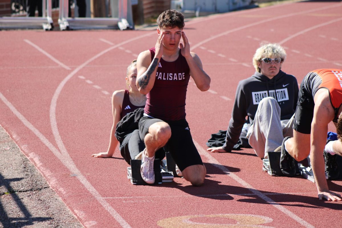 Nathan Umberger preparing for his 100 meter race.