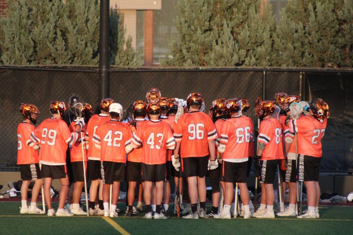 Grand Junction Boy's Lacrosse team huddled up during the 2024-2025 season.