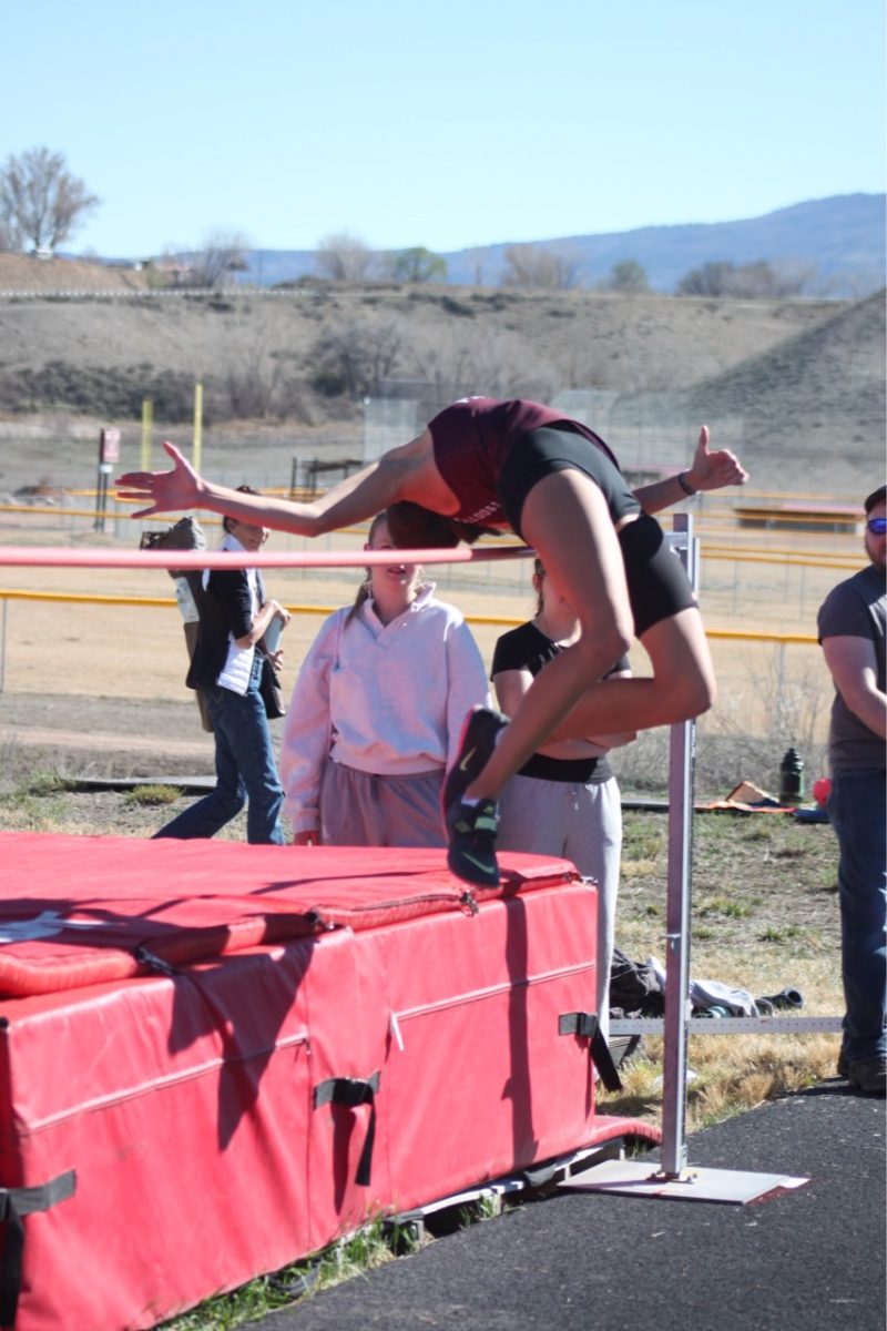Lila Huddle jumping high jump