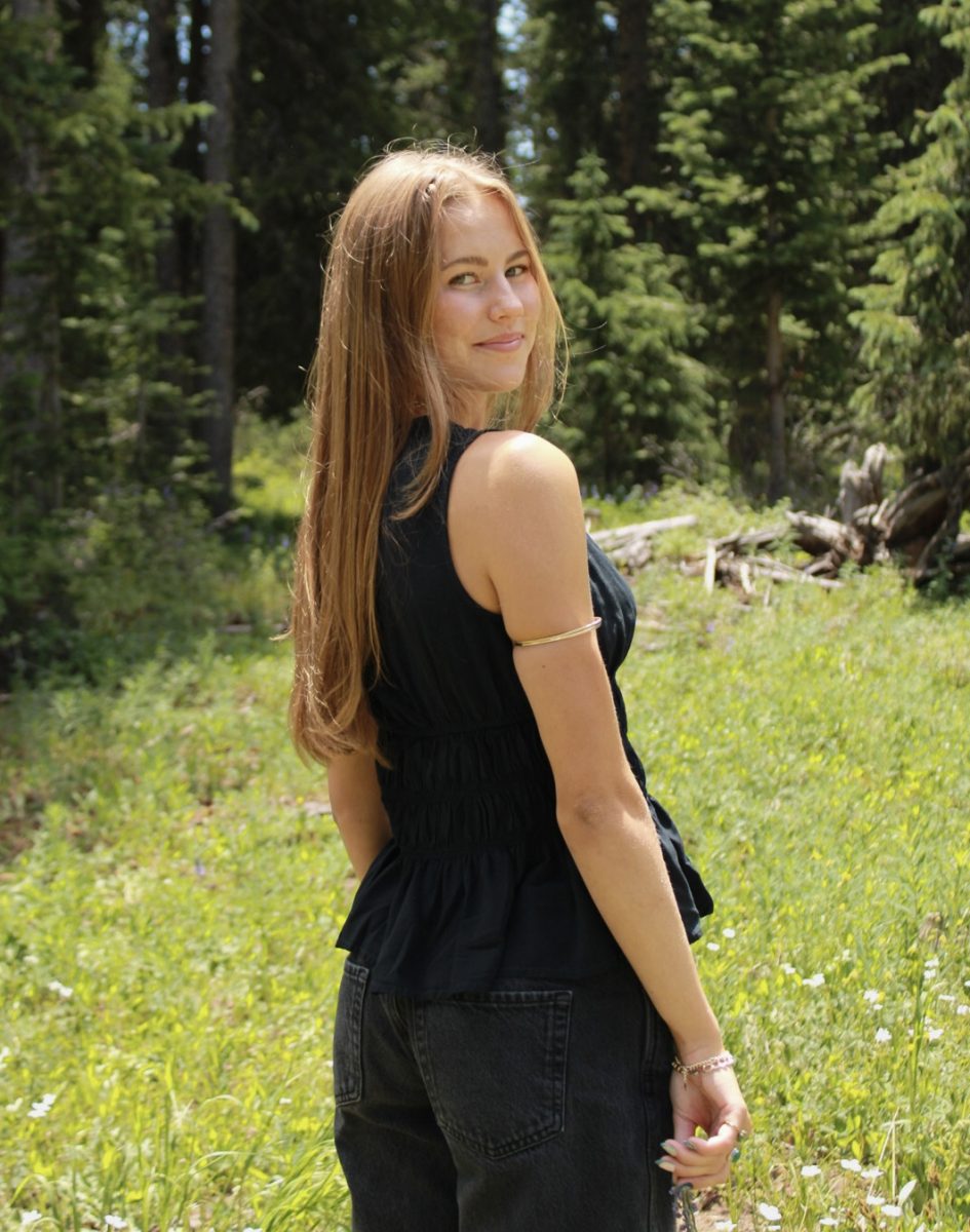Senior Kate Fricke posing outside for a photo. Photo provided by: Kate Fricke.