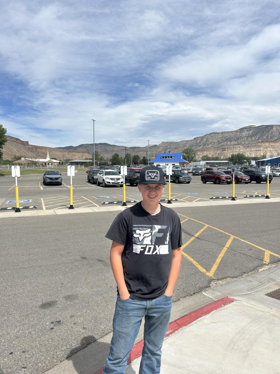 Photo of Joey Webster with power lines in the background of the photo. 