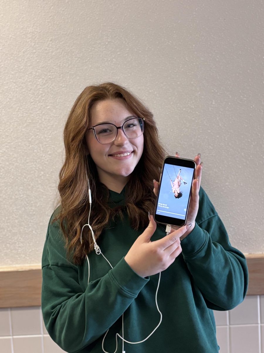 Lily Magnabosco listening to Olivia Rodrigo's new song “Drop Dead”
