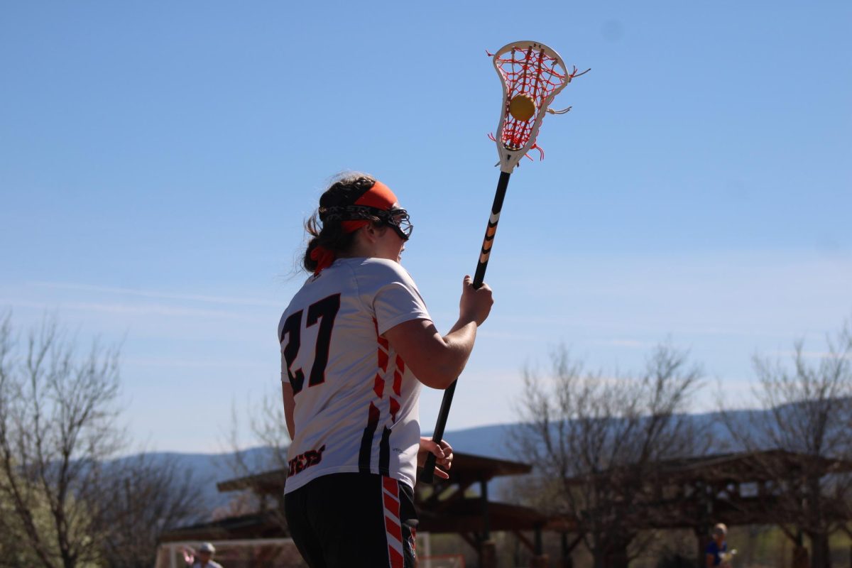 Tirzah Ridgely takes the ball down the field.